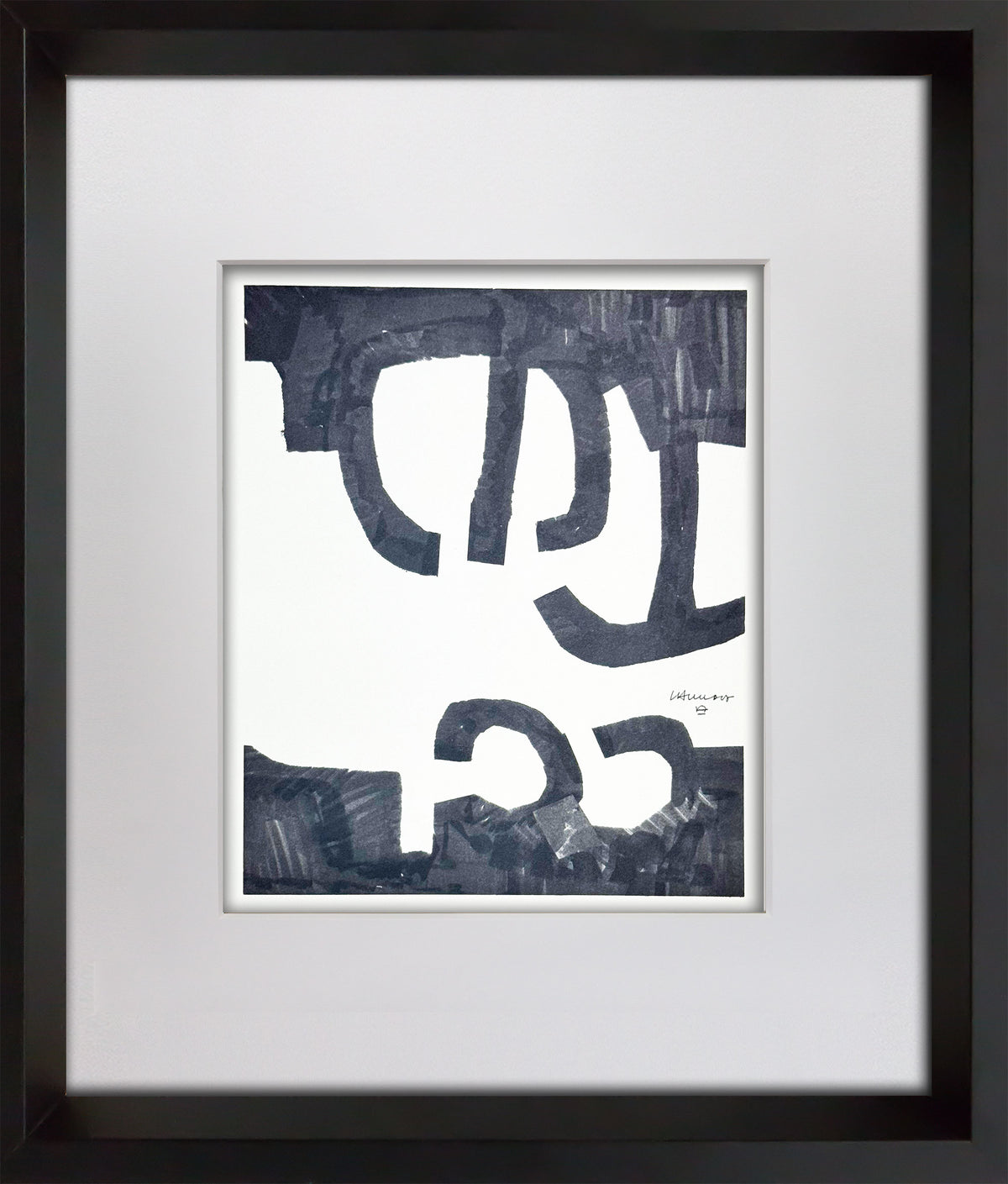 Framed abstract Eduardo Chillida art print featuring bold black and dark gray brushstrokes on a white background, matted with a wide white mat and enclosed in a black frame.
