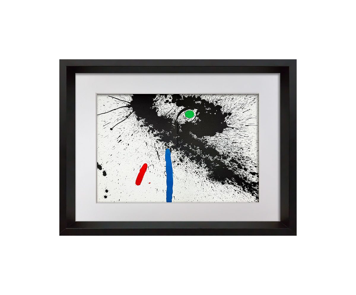 Framed abstract wall art featuring a black frame, white mat, and an abstract composition with a large black splatter shape, a vertical blue stroke, a red diagonal stroke, and a small green oval on a white background.