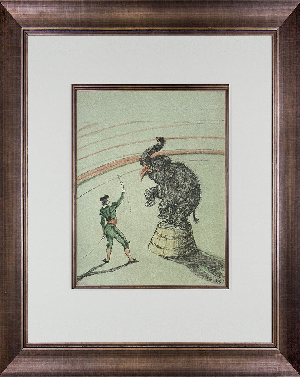 Framed Toulouse lautrec art print featuring a vintage-style illustration of a ringmaster facing a large elephant in a circus setting, presented in a dark brown wood frame with a white mat.